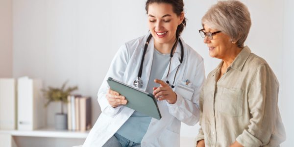 Female,Patient,Listening,To,A,Doctor,In,Hospital.