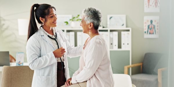 Woman,,Doctor,And,Mature,Patient,For,Consulting,,Support,Or,Conversation