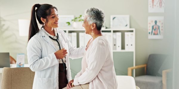 Woman,,Doctor,And,Mature,Patient,For,Consulting,,Support,Or,Conversation